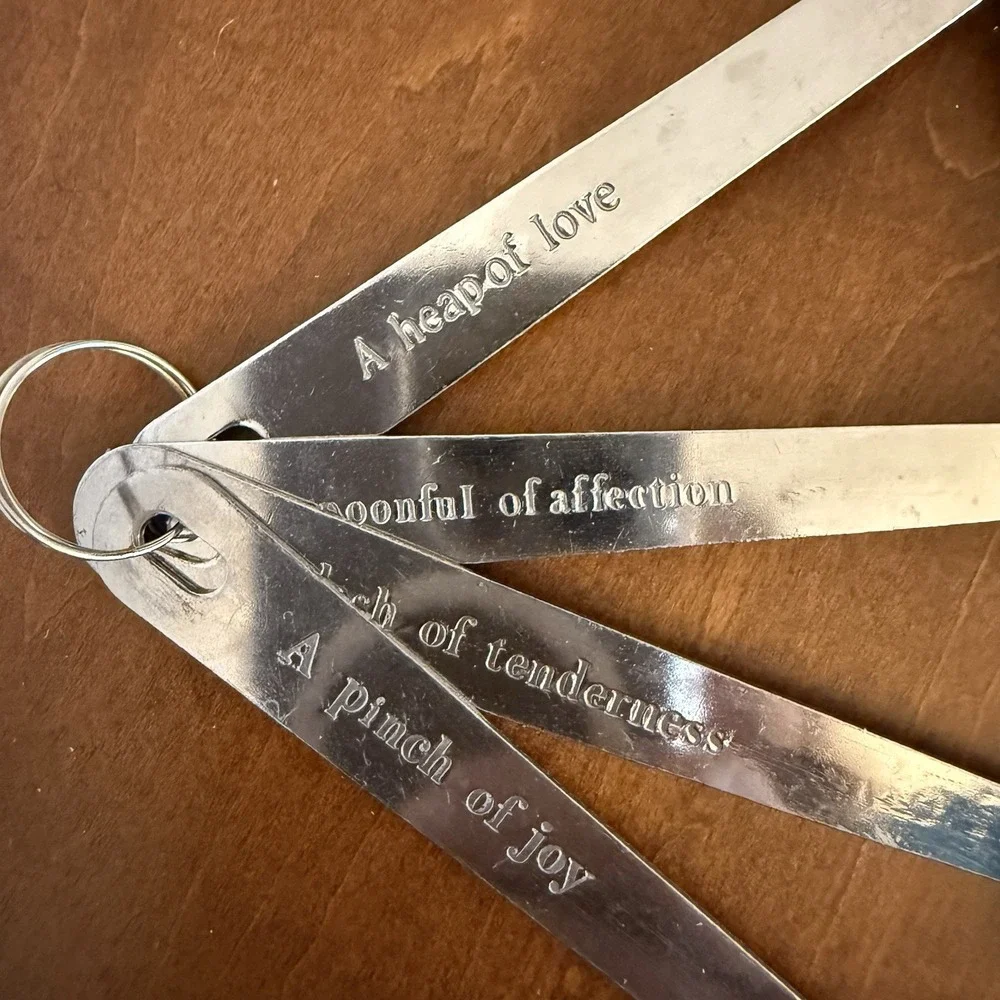 Set of 4 Stainless Steel Heart Shaped Measuring Spoons with Phrases